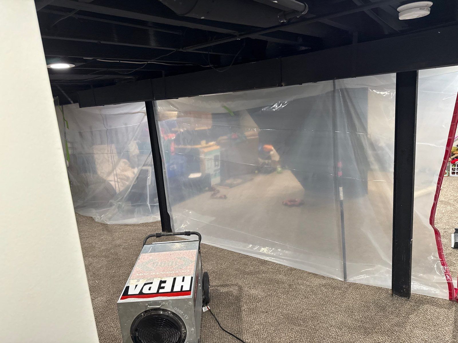 Basement containment with an air scrubber