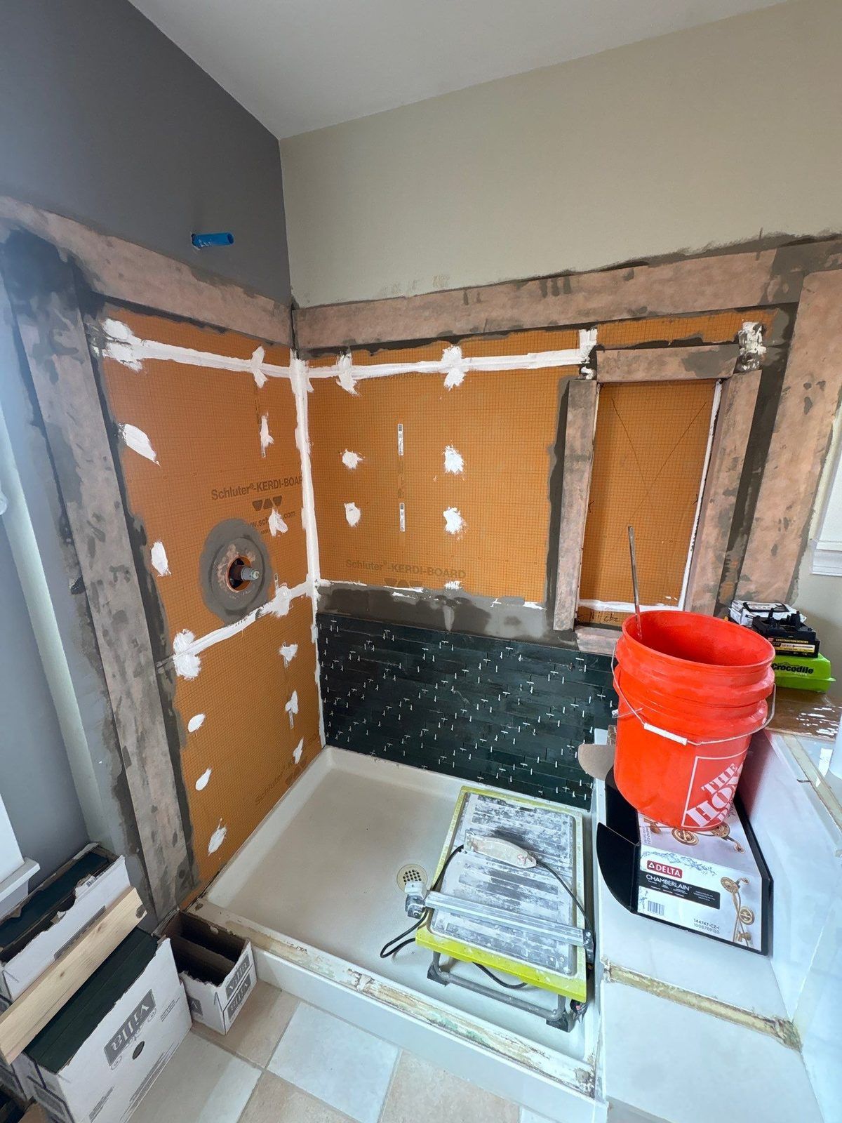 During: new backer board and tile