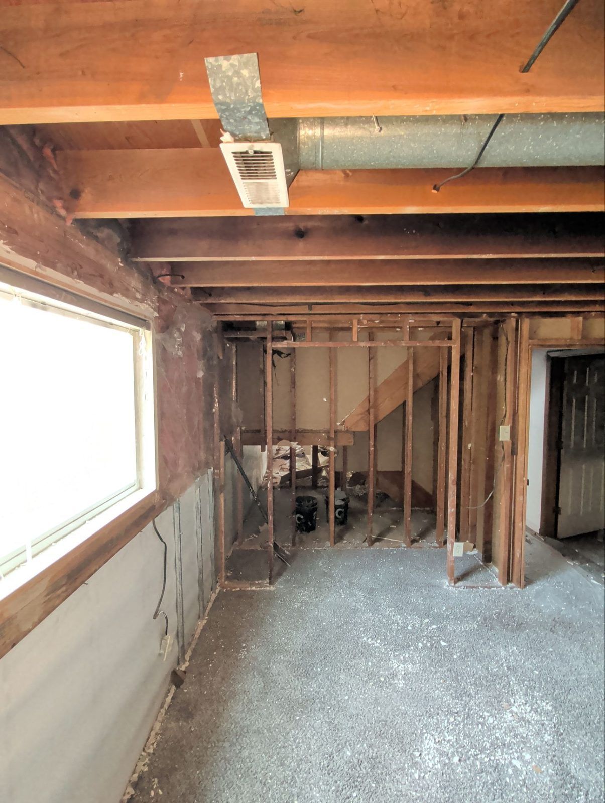 Fire-damaged walls and joists exposed