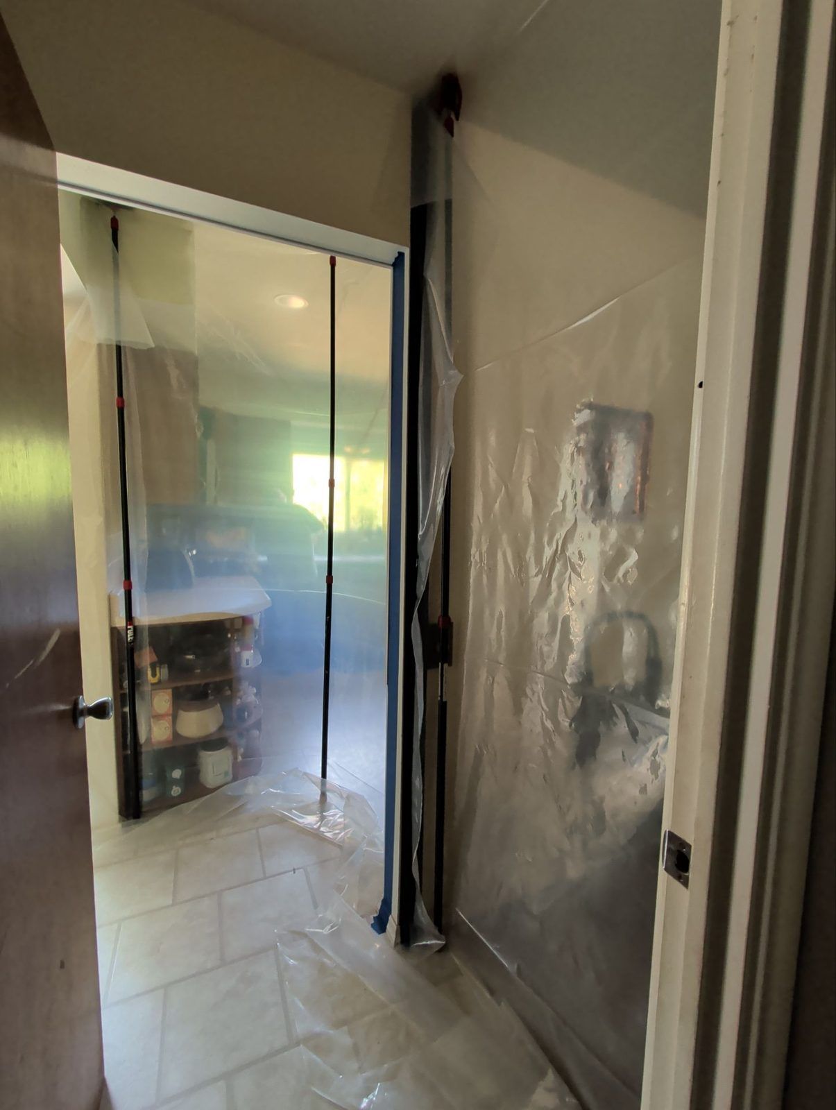 Hallway containment under negative air